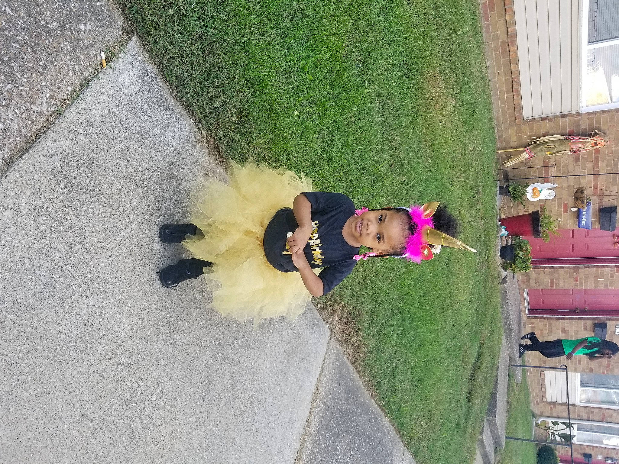 Jlayvonna is registered to the contest to win money with this photo: asphalt, concrete, driveway, fun, fur, grass, leisure, pedestrian, person, plant, road_surface, shadow, sidewalk, street_fashion, tail, toddler, tree, window