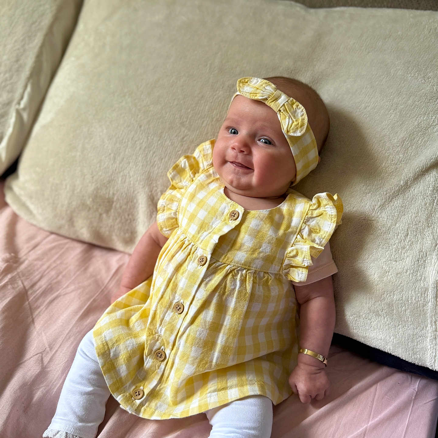 Maggie-May is registered to the contest to win money with this photo: baby, bodypart, cap, clothing, couch, cushion, face, finger, furniture, hand, happy, hat, head, homedecor, pants, person, photography, portrait, sitting, smile