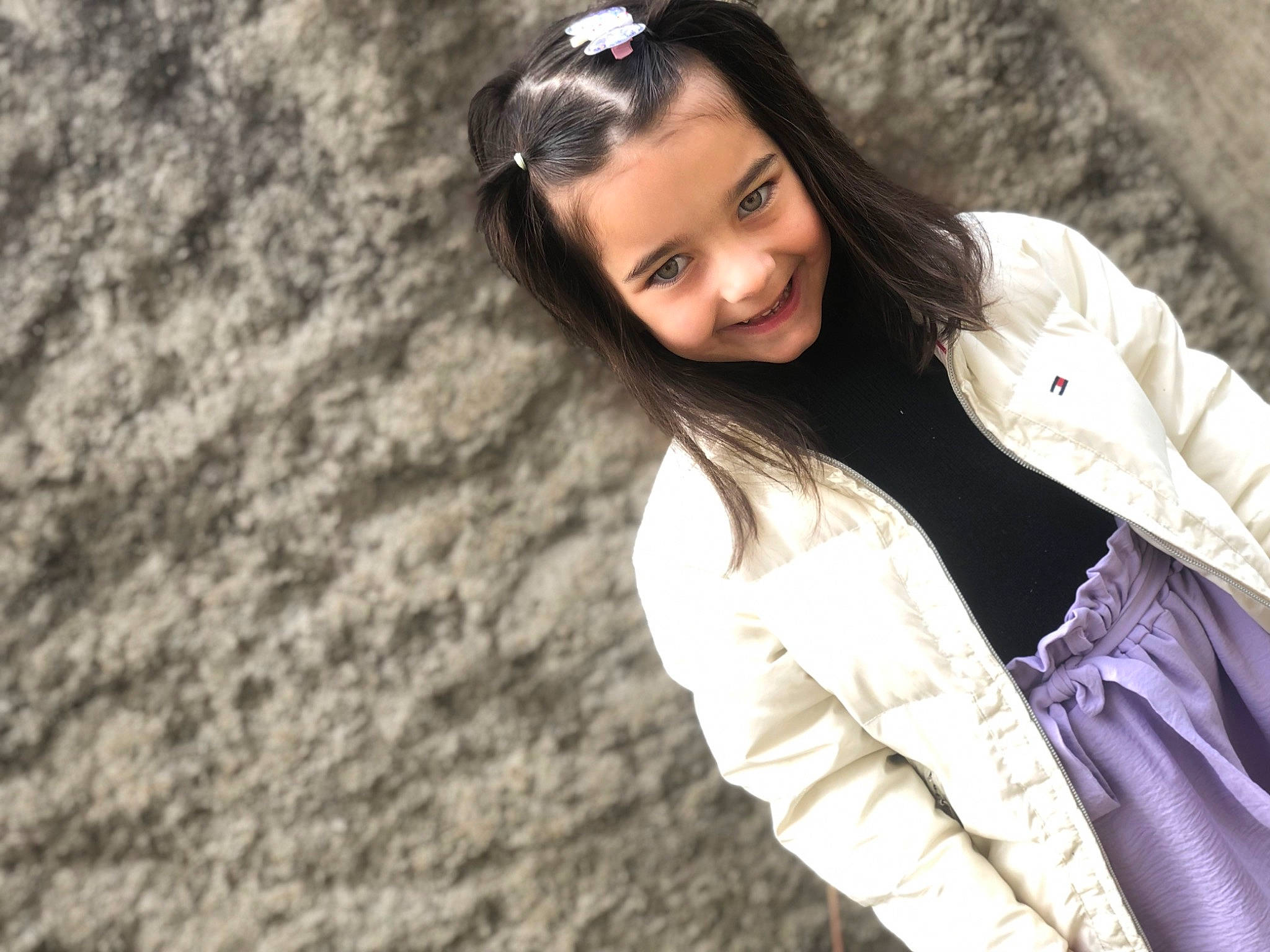 Miha a rejoint le concours — aidez-le/la à gagner de superbes lots ! black_hair, blond, brown_hair, child, cool, flash_photography, fun, fur, grass, happy, jacket, joy, leisure, lip, long_hair, people_in_nature, person, portrait_photography, sitting, smile