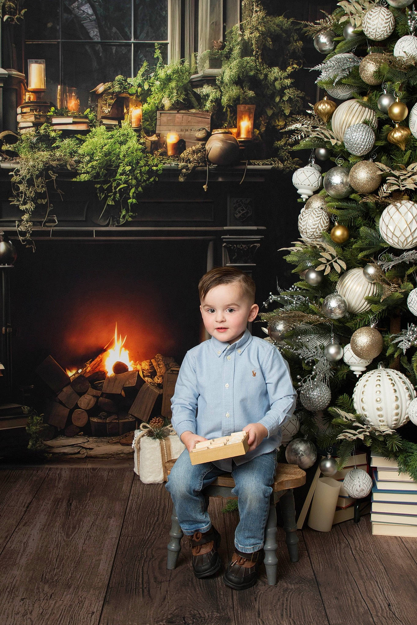 Kamdyn Reece joined the competition — help win amazing prizes! christmas_decoration, christmas_ornament, christmas_tree, conifer, event, evergreen, fire, gas, heat, holiday, holiday_ornament, home, ornament, person, plant, sitting, toddler, tradition, tree, winter