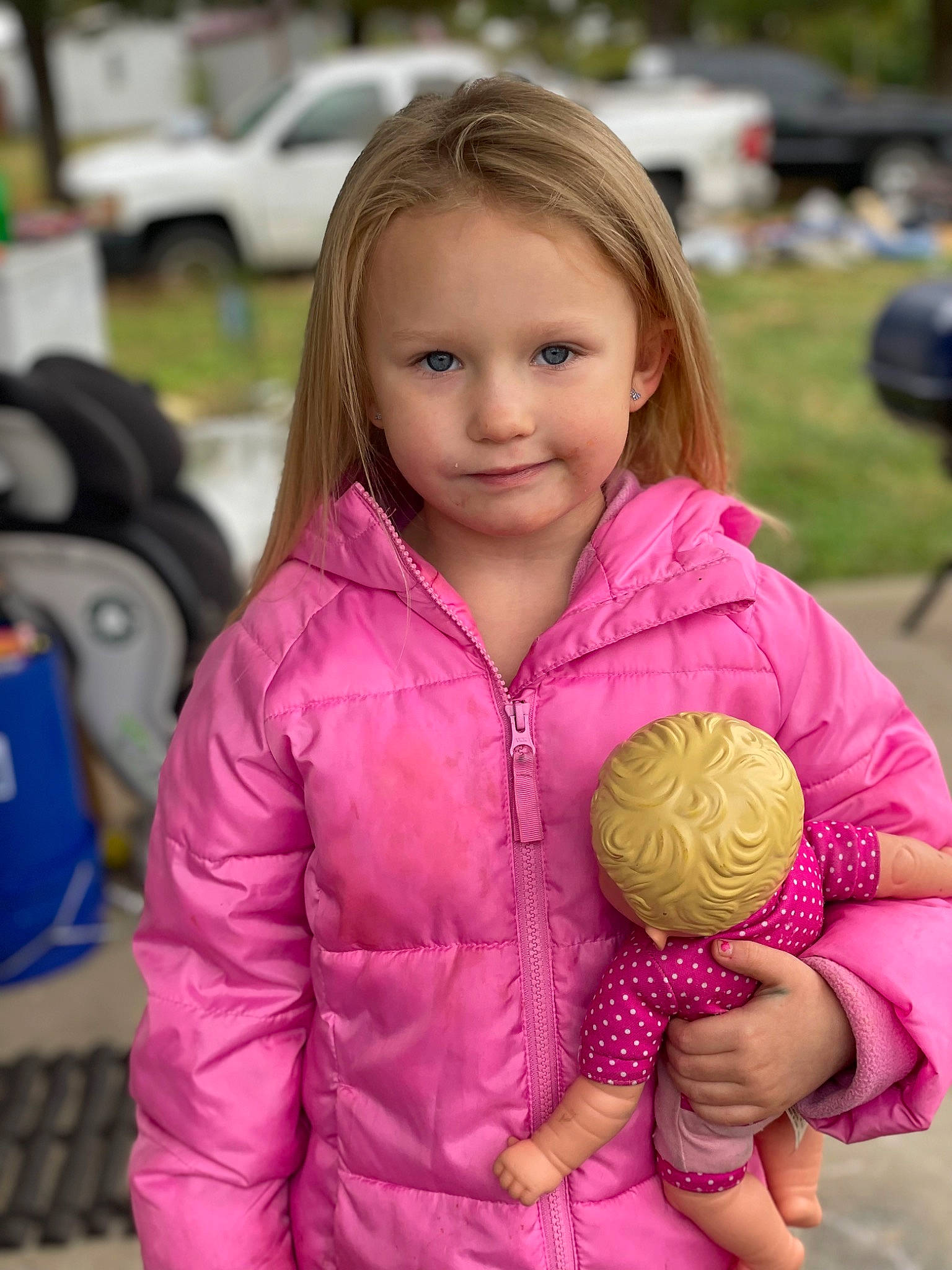 Vyera joined the competition — help win amazing prizes! baby_toddler_clothing, blond, chair, cheek, child, facial_expression, finger, fun, grass, happy, head, iris, joy, magenta, person, pink, skin, sleeve, thumb, tire