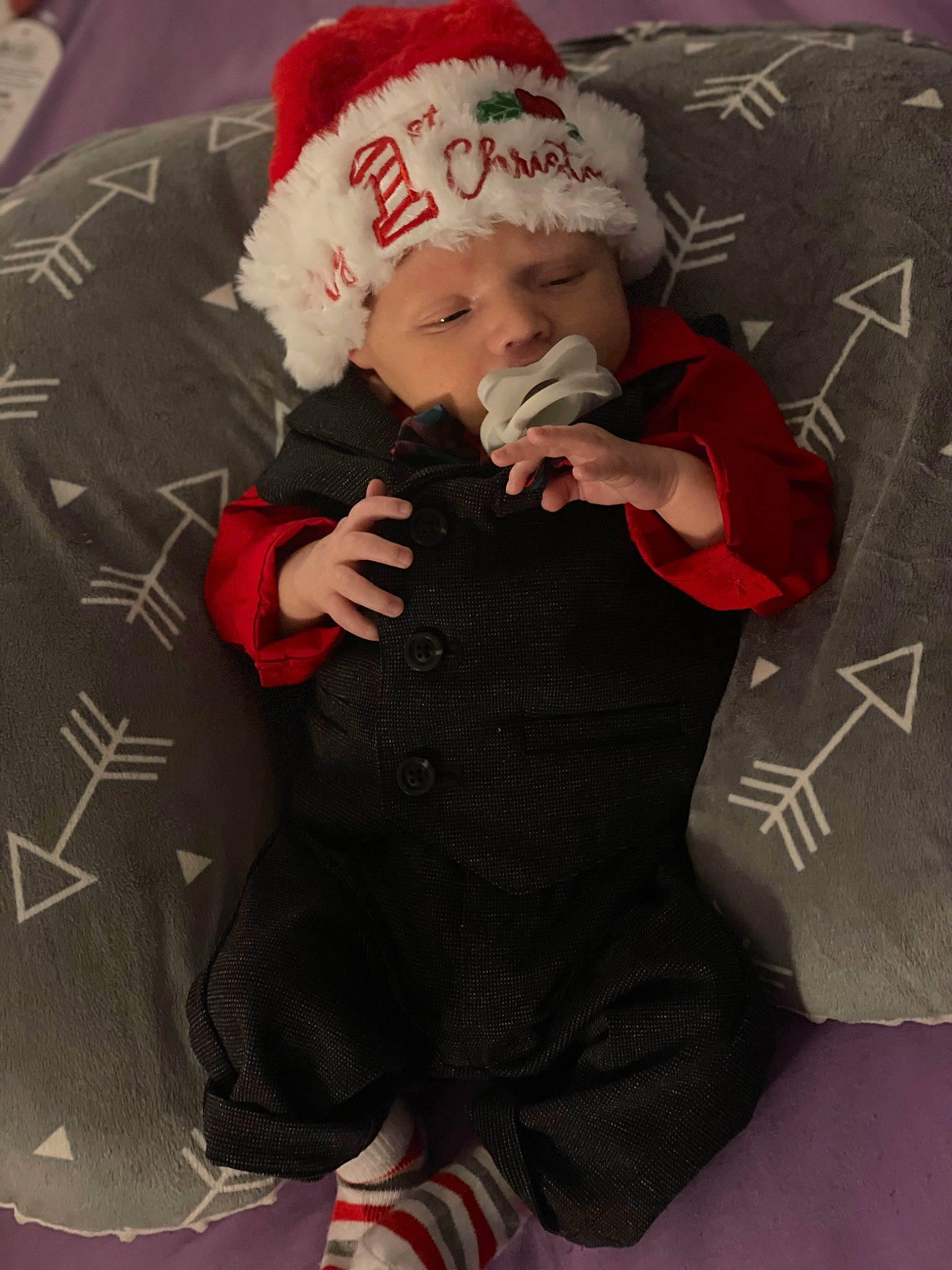 Shylo is registered to the contest to win money with this photo: baby, baby_toddler_clothing, carmine, child, christmas, comfort, event, eye, facial_expression, fictional_character, gesture, happy, headgear, headwear, lap, person, santa_claus, sitting, sleeve, smile