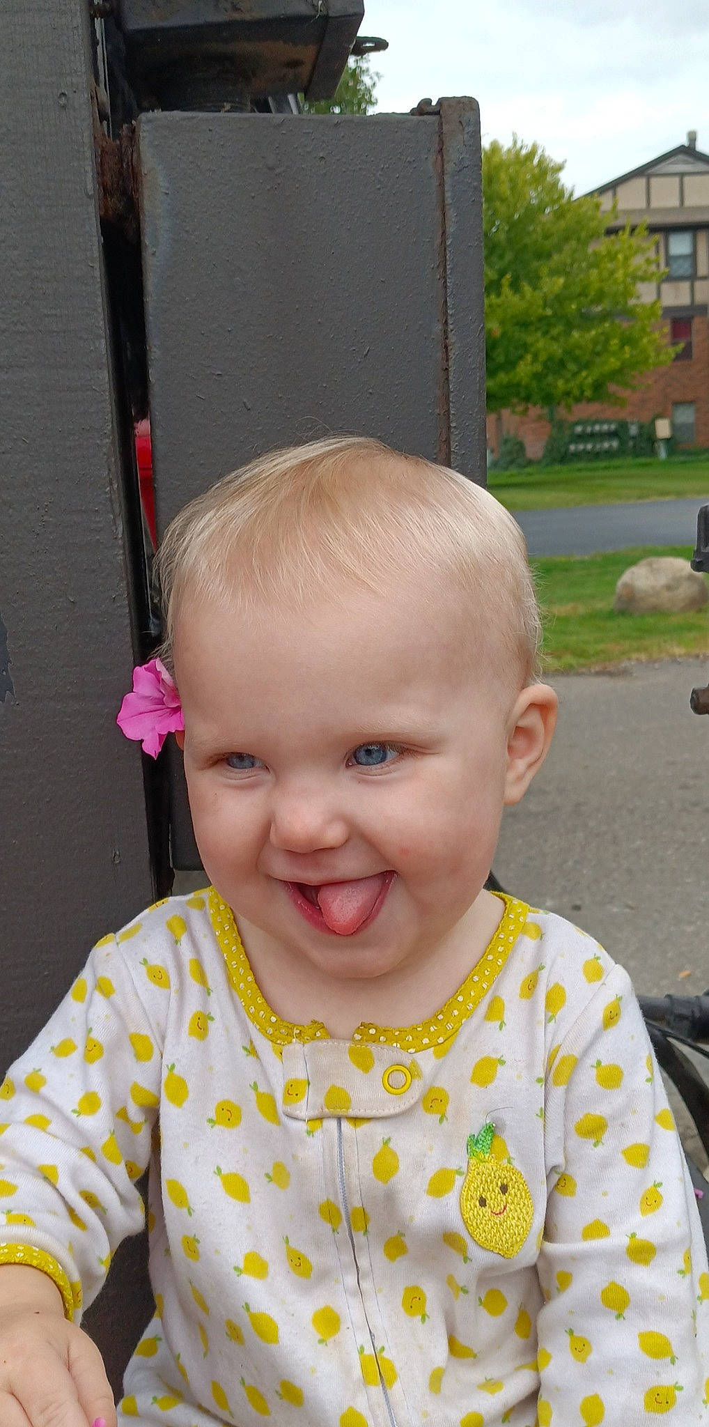 Addison is registered to the contest to win money with this photo: baby, baby_toddler_clothing, cheek, grass, hair, hairstyle, happy, head, iris, joy, lip, nose, person, pink, plant, product, skin, sleeve, smile, standing
