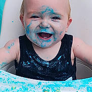 Haiden joined the competition — help win amazing prizes! baby, bodypart, chair, clothing, cream, dessert, face, food, furniture, happy, head, icing, laughing, mouth, person, photography, portrait, smile, summer, t_shirt