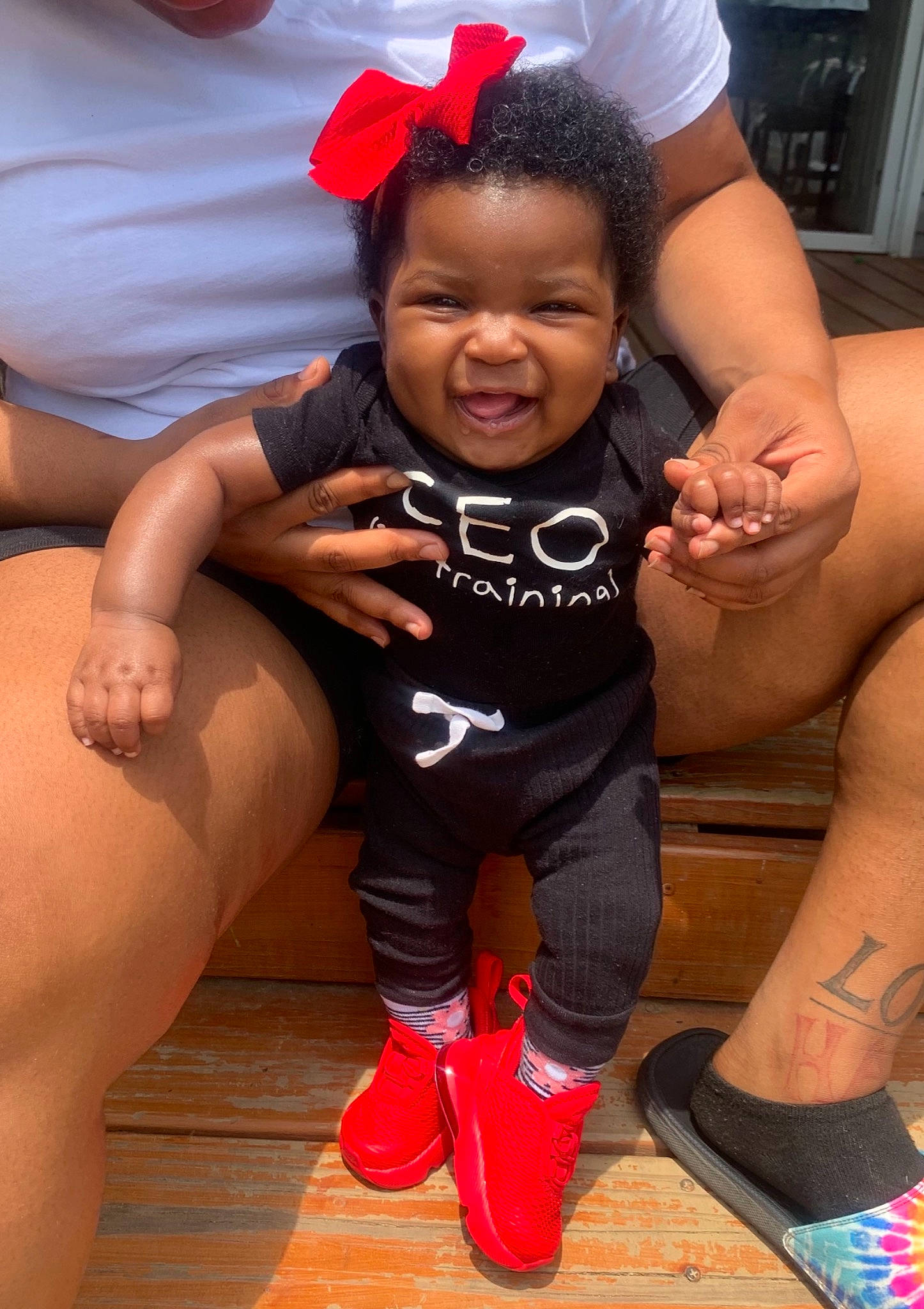 Kioni joined the competition — help win amazing prizes! arm, face, footwear, gesture, happy, head, human, human_body, joint, knee, leg, mammal, muscle, orange, organ, person, skin, smile, standing, thigh