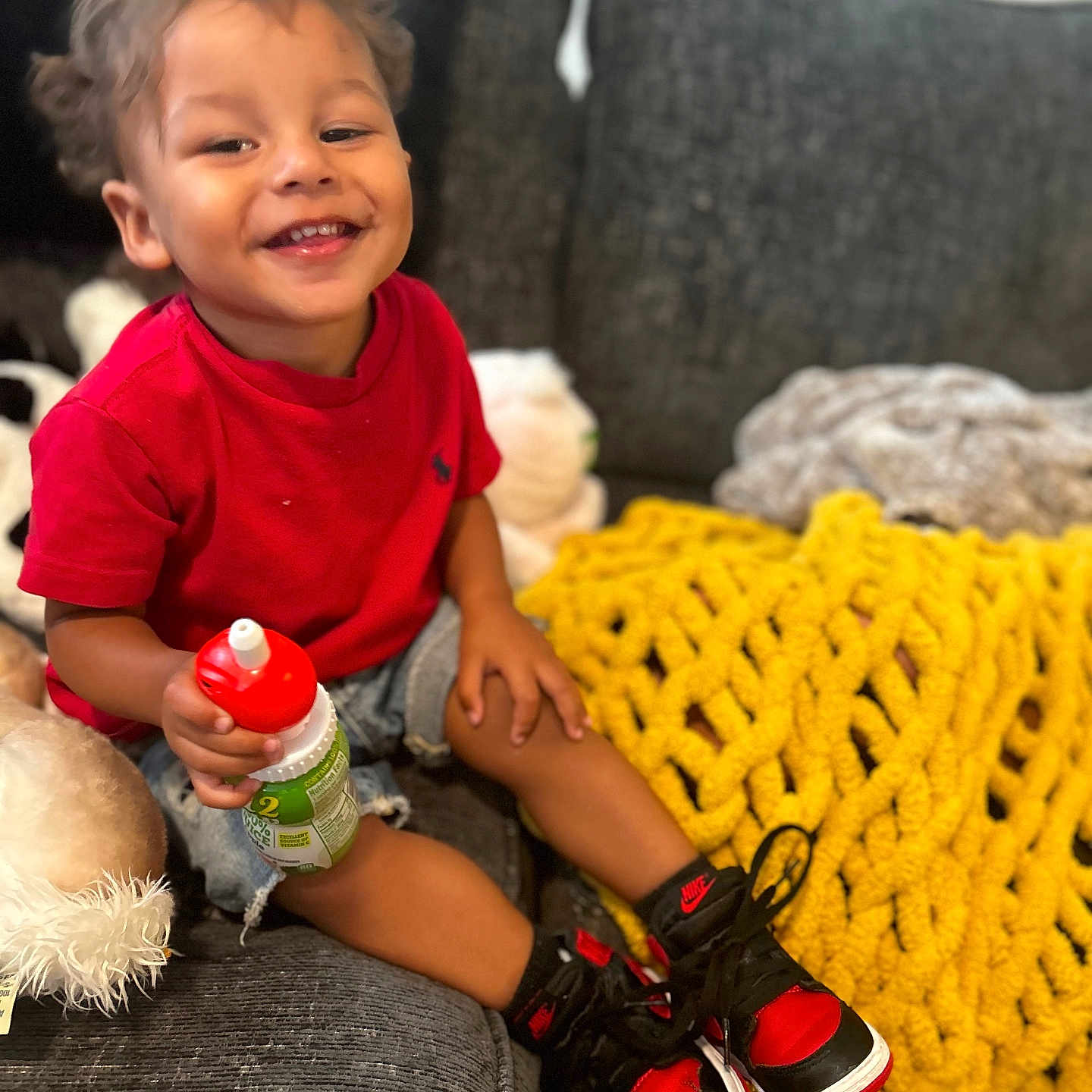 Reign joined the competition — help win amazing prizes! bodypart, child, clothing, couch, cushion, face, female, finger, footwear, furniture, girl, head, homedecor, person, photography, portrait, shoe, shorts, sitting, sneaker