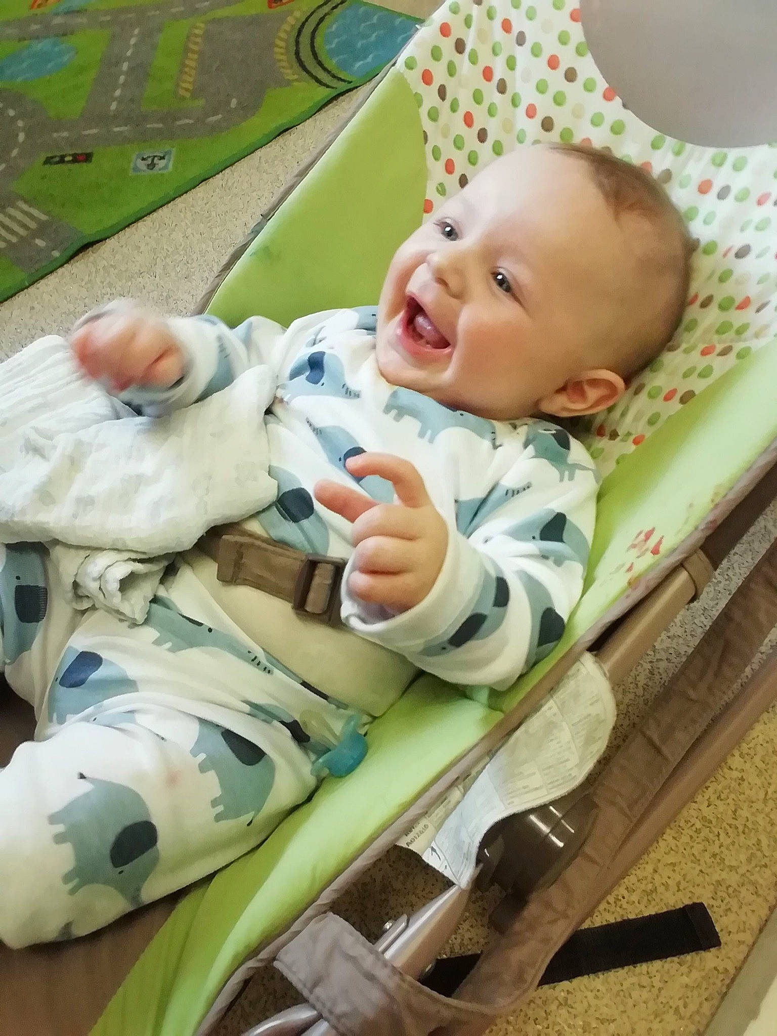 Lachlan is registered to the contest to win money with this photo: baby, baby_safety, baby_toddler_clothing, cheek, comfort, facial_expression, fun, grass, green, happy, head, mammal, organ, people, person, product, skin, sleeve, smile, textile