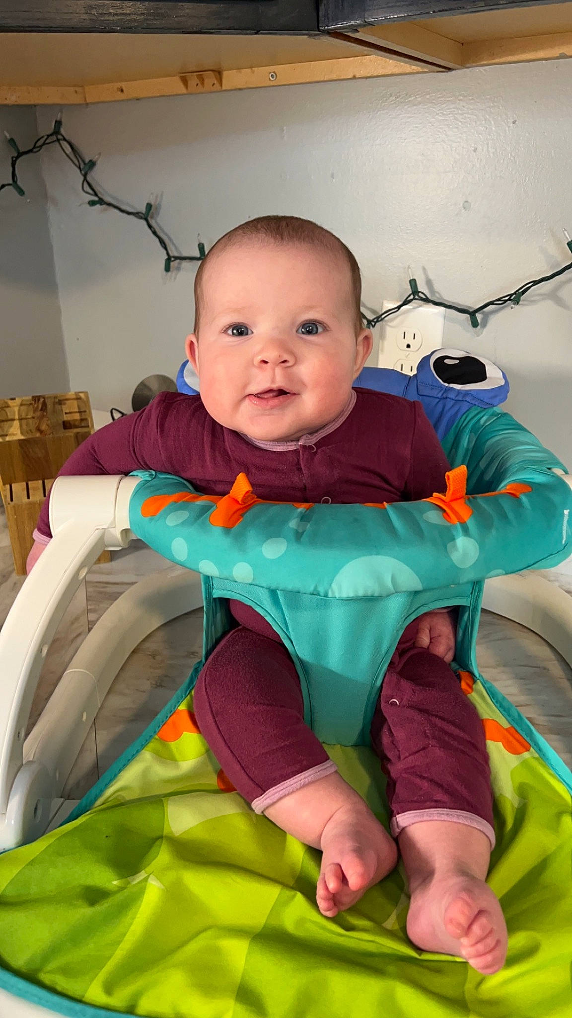 Oaklynn is registered to the contest to win money with this photo: baby, baby_toddler_clothing, chair, child, comfort, electric_blue, event, face, facial_expression, fun, grass, happy, leisure, person, product, recreation, sitting, skin, smile, t_shirt