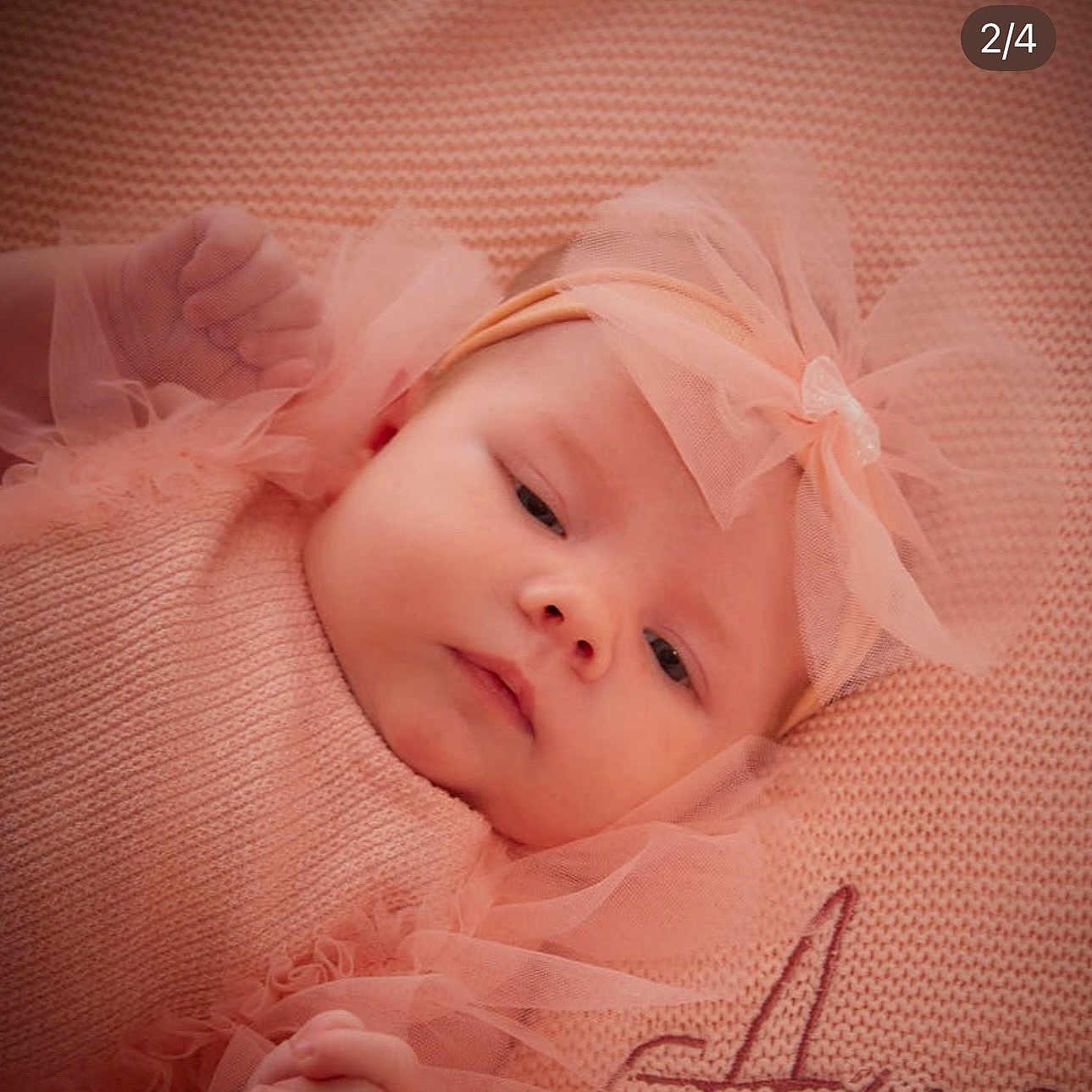 Ava Heather is registered to the contest to win money with this photo: baby, blanket, child, closeup, cozy, cute, face, hands, headband, infant, knit, lying_down, newborn, peaceful, peach, portrait, skin, sleepy, soft, tulle
