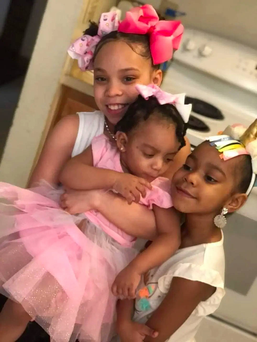 Aniyah joined the competition — help win amazing prizes! baby, bridal_clothing, child, event, eye, fashion_design, flash_photography, formal_wear, fun, gown, happy, headpiece, headwear, jewellery, joy, magenta, person, pink, room, skin