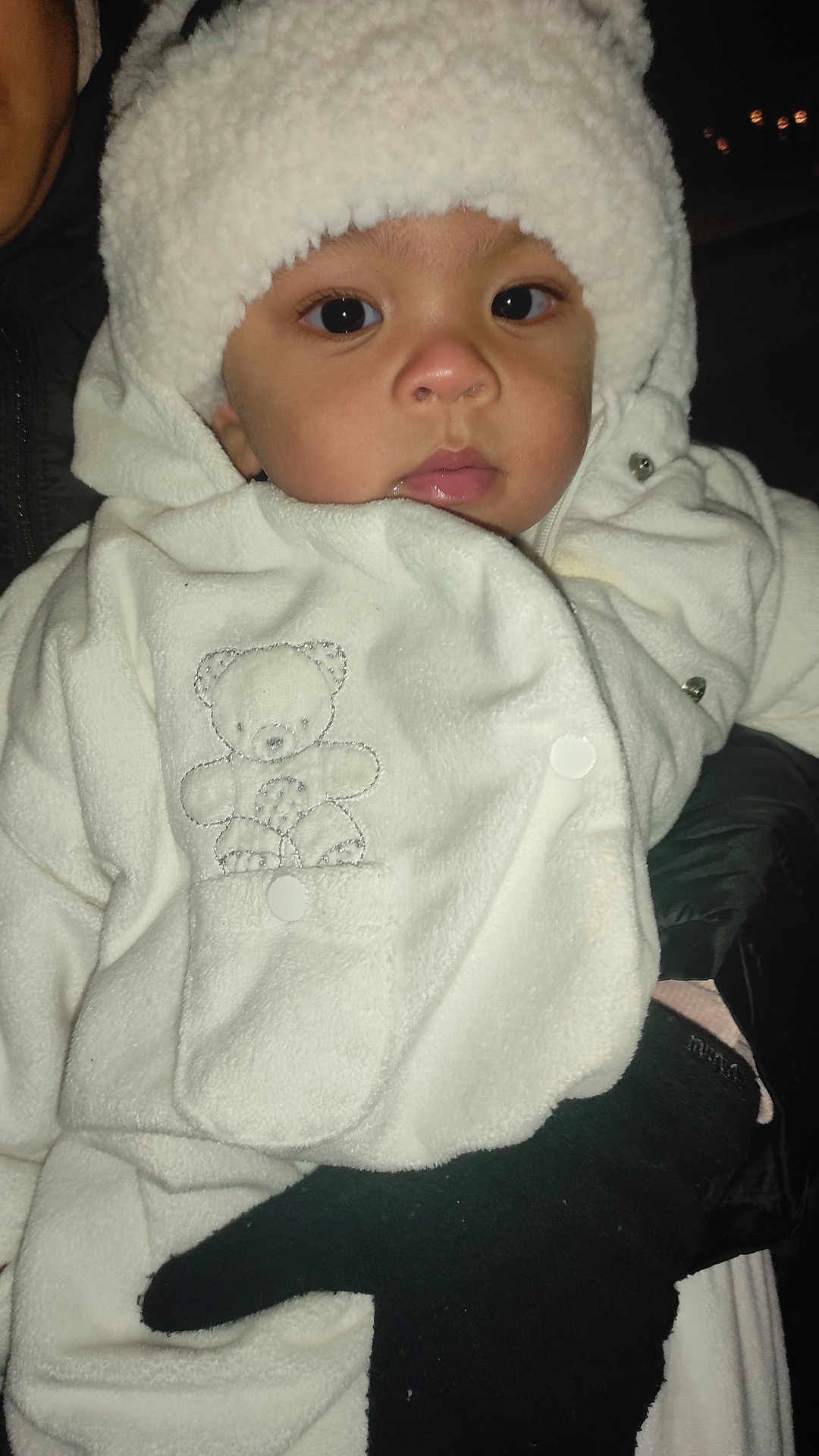Irina a rejoint le concours — aidez-le/la à gagner de superbes lots ! baby, child, face, person, clothing, white, coat, hat, glove, hand, cute, portrait, warm, winter, dark, night, teddy_bear, embroidery, button, jacket