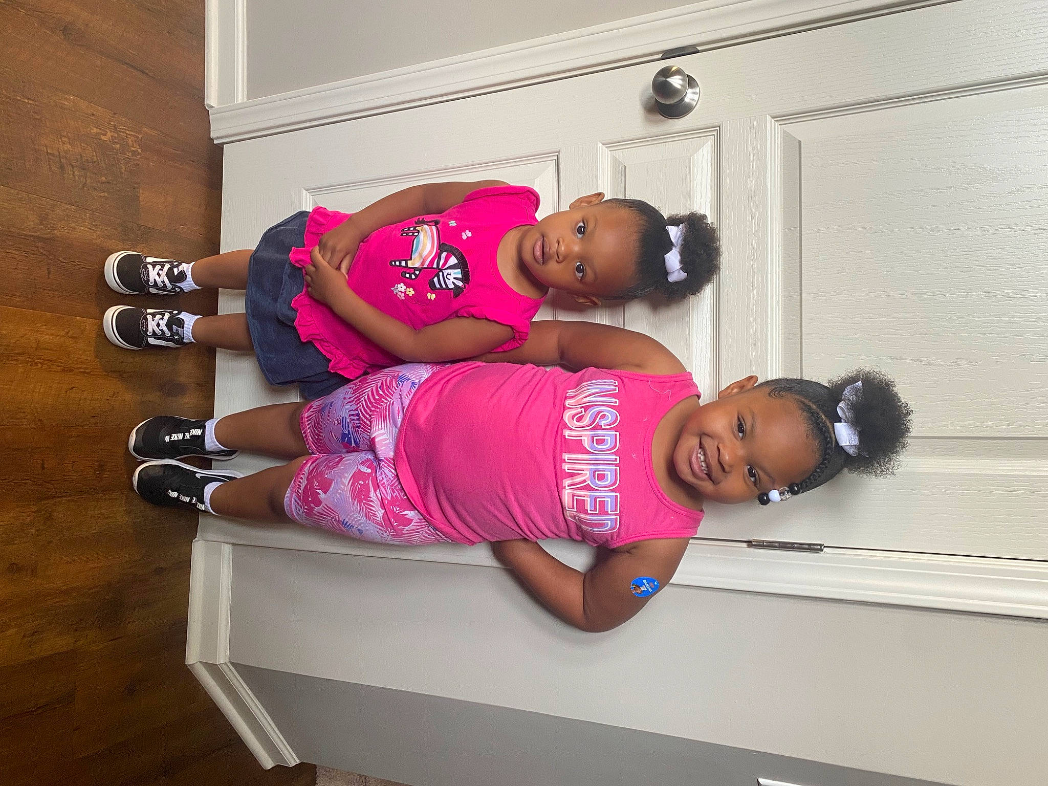 Nalayah is registered to the contest to win money with this photo: arm, chest, elbow, hat, human_leg, joint, joy, knee, leg, magenta, person, physical_fitness, pink, shorts, sleeve, sportswear, t_shirt, thigh, toddler, trunk