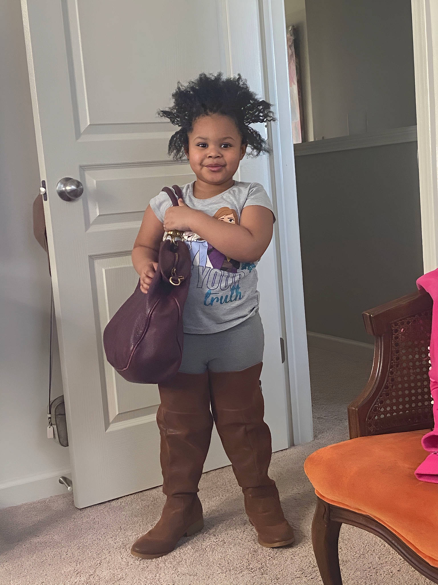 Nalayah is registered to the contest to win money with this photo: arm, chair, door, fashion_design, hand, happy, head, human_body, joint, joy, knee, mammal, person, shoe, shoulder, smile, textile, thigh, toddler, trunk