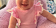 Ember is registered to the contest to win money with this photo: applique, baby, bodypart, bonnet, clothing, couch, cushion, face, finger, furniture, hand, happy, hat, head, homedecor, person, photography, portrait, sitting, smile