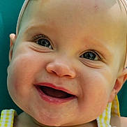 Ember joined the competition — help win amazing prizes! baby, child, smiling, face, headband, bow, dress, yellow, checkered, stars, closeup, portrait, happy, cute, infant, cheeks, eyes, expression, colorful, clothing
