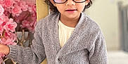 Zarah joined the competition — help win amazing prizes! accessories, adult, blackhair, cardigan, clothing, coat, face, female, glasses, hair, happy, head, knitwear, person, sleeve, smile, sweater, woman