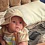 Jenson joined the competition — help win amazing prizes! baby, bed, blanket, clothing, cute, eyes, face, fingertip, furniture, hand, hat, holding, indoors, infant, person, pillow, portrait, skin, smartphone, tshirt