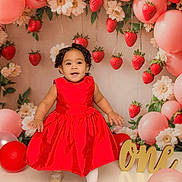 Brittany joined the competition — help win amazing prizes! toddler, child, red_dress, balloons, strawberries, flowers, birthday, celebration, one, golden_sign, smiling, indoor, portrait, cute, festive, decorations, happy, standing, party, photography