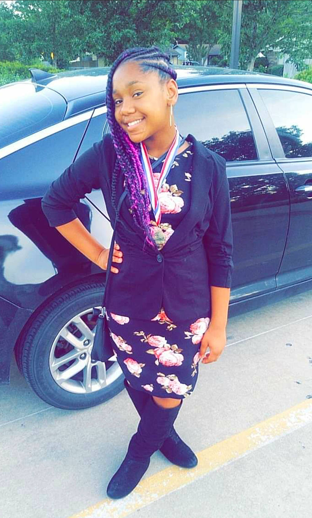 Na'Kia is registered to the contest to win money with this photo: black_hair, car, city_car, family_car, footwear, joy, long_hair, minivan, person, photography, shoe, snapshot, street_fashion, style, tights, vehicle, vehicle_door