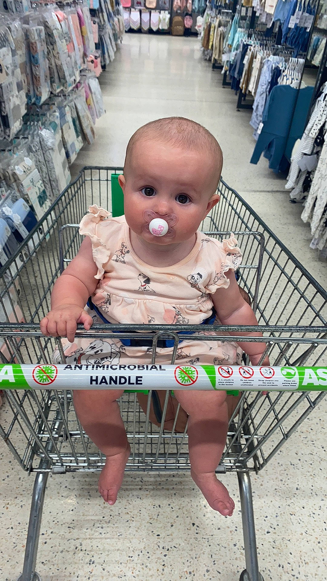 Luna joined the competition — help win amazing prizes! baby, baby_products, child, city, doll, eyewear, fun, human_leg, leisure, person, photograph, retail, shopping, shopping_cart, shorts, sidewalk, sitting, skin, toddler, vacation