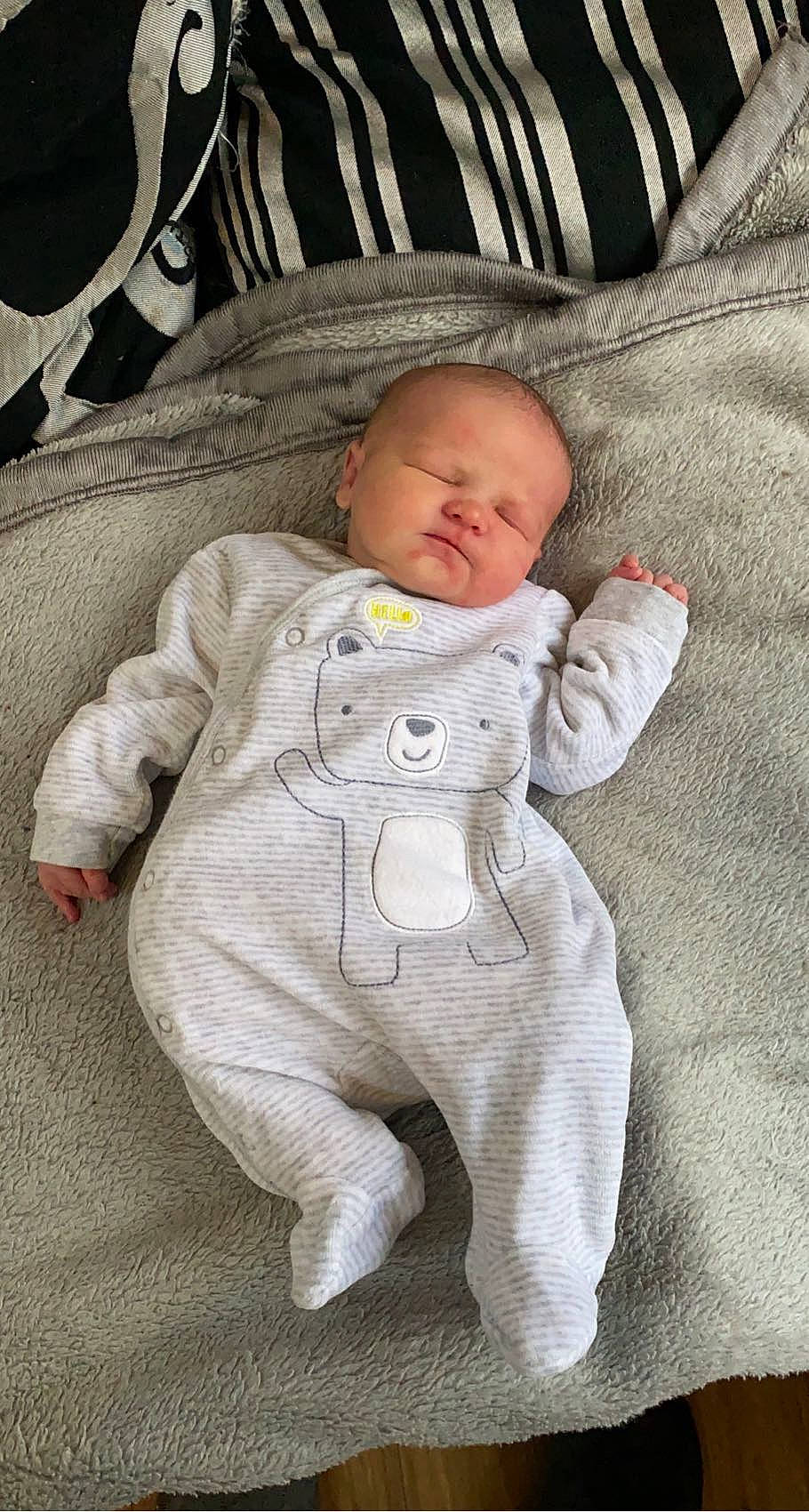 Luna joined the competition — help win amazing prizes! baby, baby_products, baby_sleeping, baby_toddler_clothing, cheek, child, comfort, eye, face, flooring, foot, head, linens, mammal, nose, person, sitting, skin, sleeve, textile