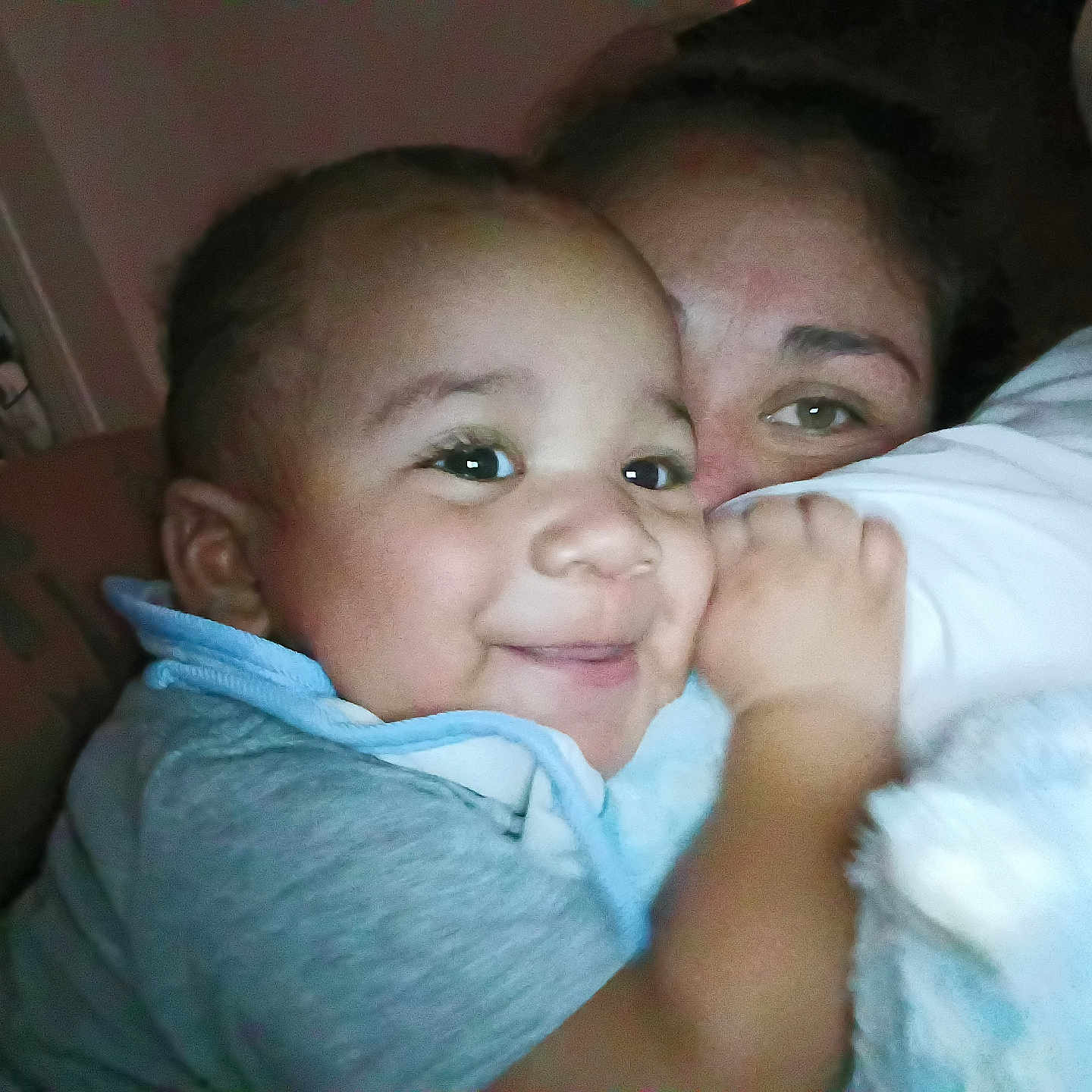 Legend joined the competition — help win amazing prizes! baby, child, infant, adult, parent, cuddle, hug, smiling, happy, face, portrait, selfie, indoor, home, bed, pajamas, clothing, family, closeup, affection
