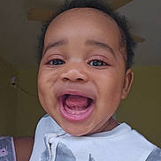 Adriel joined the competition — help win amazing prizes! baby, ceiling_fan, child, clothing, cute, expression, eyes, face, hair, happy, head, indoor, mouth_open, person, portrait, skin, smiling, toddler, whale_print, young
