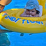 baby, infant, pool, water, float, inflatable, yellow, hat, child, summer, outdoor, swimming, person, adult, cap, blue, relaxation, floating, cute, sunlight