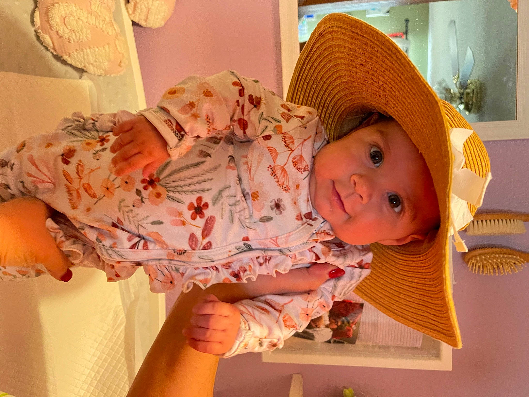 Mercedes joined the competition — help win amazing prizes! baby, baby_products, baby_toddler_clothing, child, comfort, happy, hat, headgear, headwear, human_leg, linens, mouth, orange, peach, person, pink, room, skin, smile, textile
