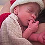 Noah participe au concours pour gagner de l'argent avec cette photo : newborn, baby, sleeping, infant, blanket, knitted_hat, closeup, hand, face, peaceful, soft_texture, wrapped, cozy, skin, portrait, resting, cute, tiny, human, child