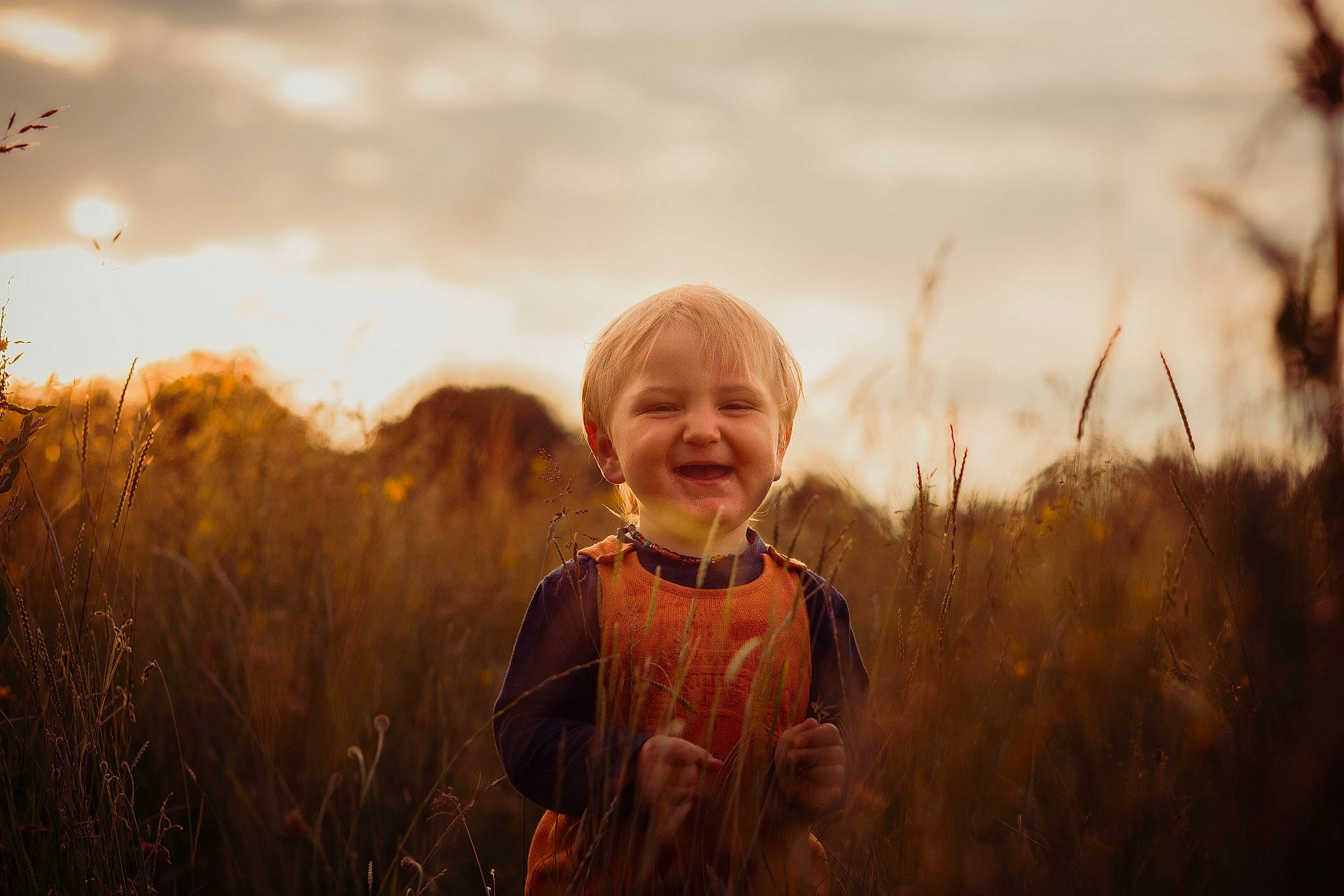 Arrow is registered to the contest to win money with this photo: cloud, face, flash_photography, grass, grass_family, grassland, happy, head, iris, joy, landscape, meadow, natural_landscape, people_in_nature, person, plant, rural_area, sky, smile, sunlight