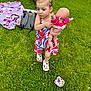 accessories, baby, backyard, bag, clothing, dress, face, grass, head, lawn, nature, outdoors, park, person, photography, plant, portrait, shorts, summer, yard