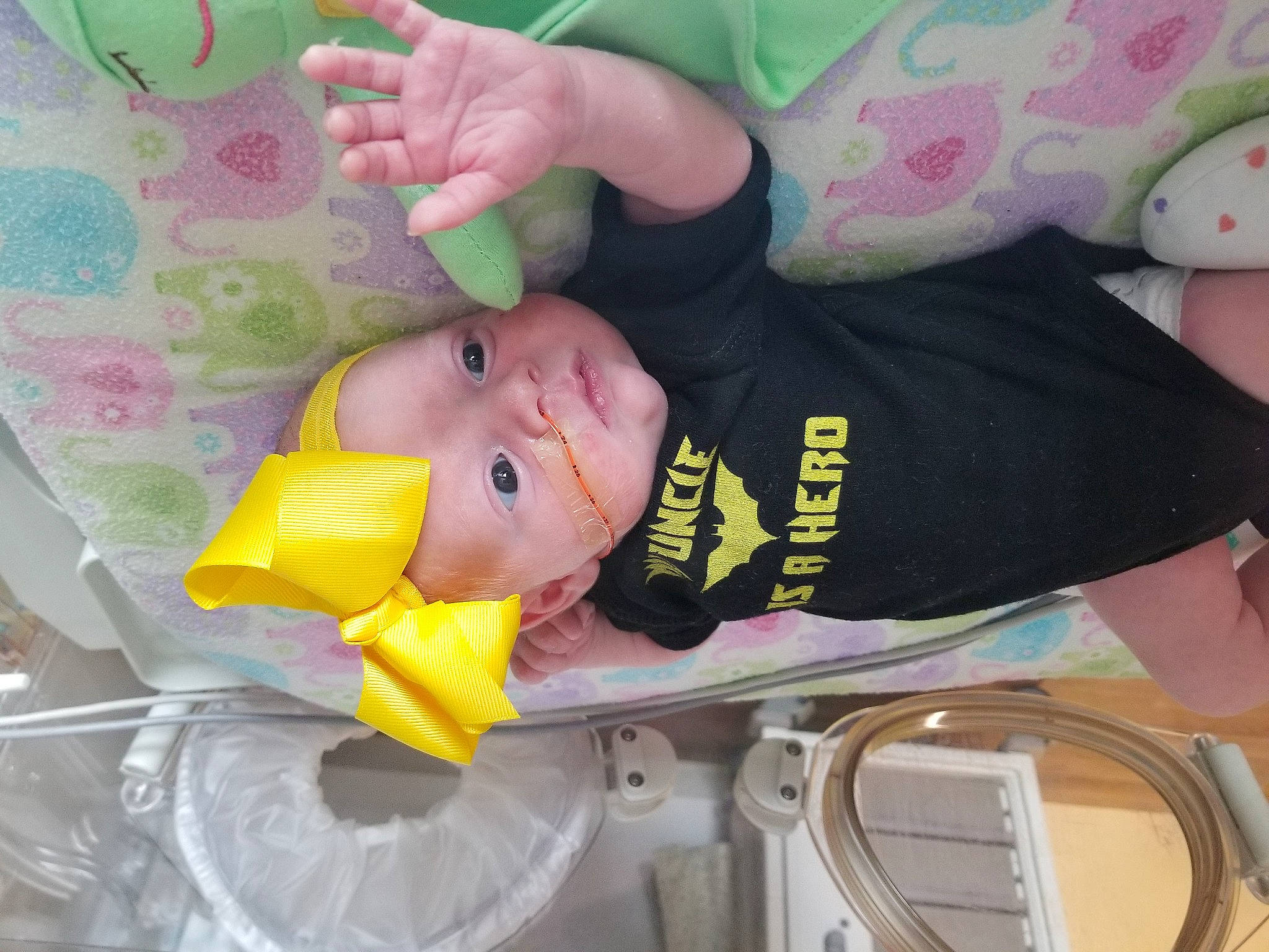 Mackenzie is registered to the contest to win money with this photo: baby, baby_products, baby_toddler_clothing, chair, child, comfort_food, finger, food, person, room, skin, toddler