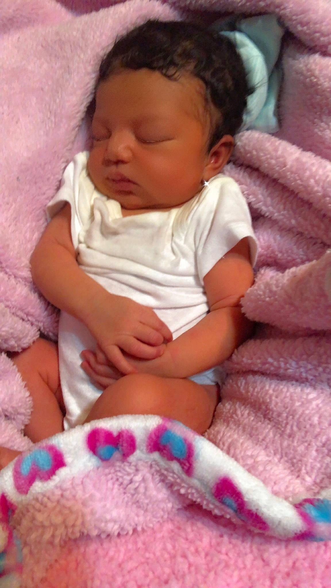 Amoura joined the competition — help win amazing prizes! baby, baby_toddler_clothing, cheek, chin, comfort, eye, eyebrow, facial_expression, finger, iris, lip, mouth, nose, person, pink, product, purple, skin, sleeve, textile