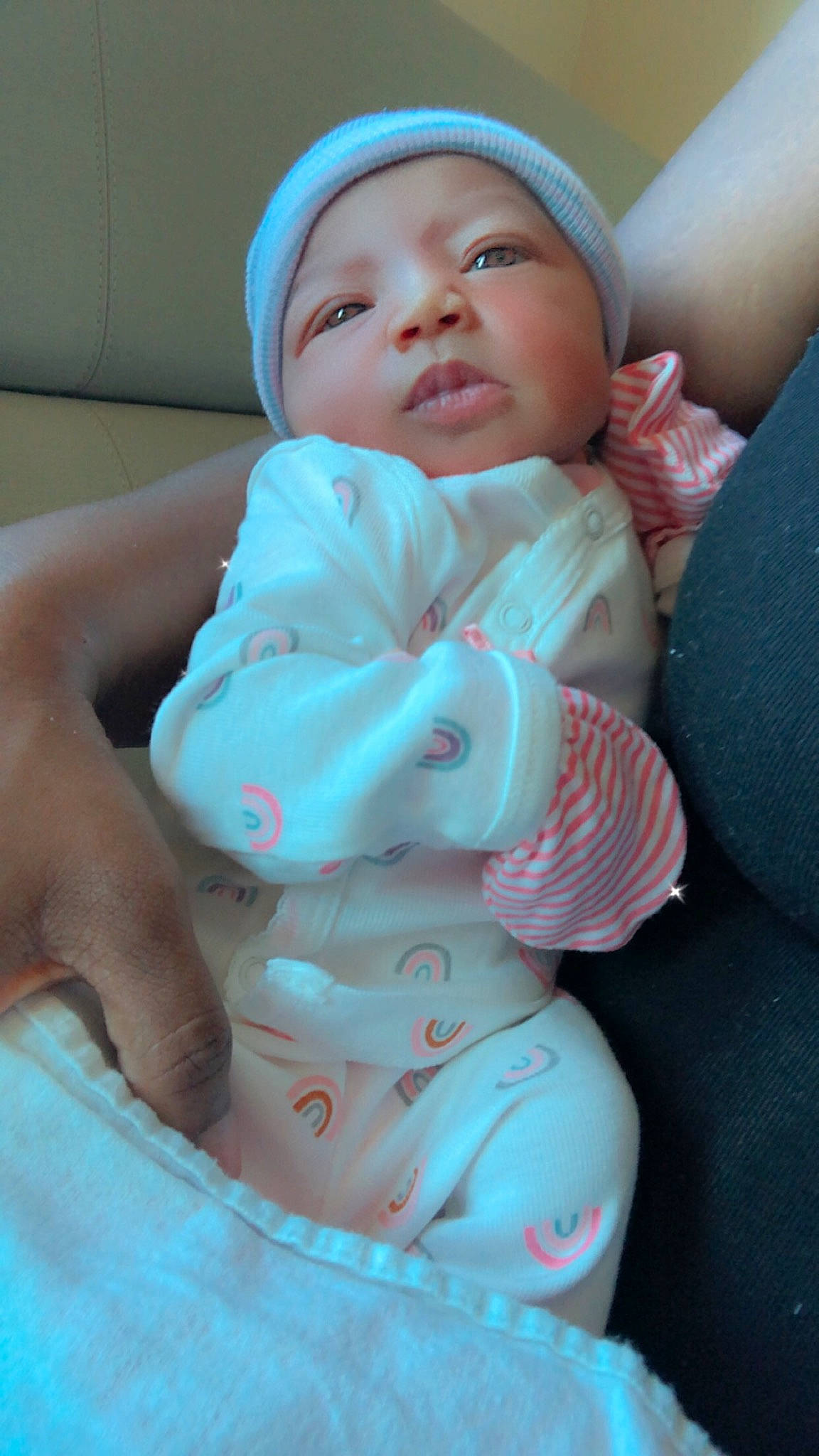 Amoura is registered to the contest to win money with this photo: baby, baby_products, baby_sleeping, baby_toddler_clothing, cap, cheek, child, comfort, drinkware, finger, hat, head, headwear, health_care, linens, lip, person, pink, skin, sleeve