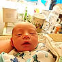 Brandon joined the competition — help win amazing prizes! architecture, baby, beverage, blanket, bodypart, building, clothing, coffee, coffeecup, cup, face, furniture, glove, head, hospital, newborn, person, photography, portrait, sleeping