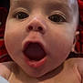 baby, child, face, mouth_open, close_up, expression, curious, skin, head, eyes, infant, portrait, indoors, person, human, newborn, cheeks, background, red, black