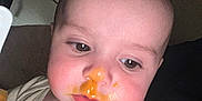 Kai joined the competition — help win amazing prizes! baby, casual, cheeks, child, closeup, clothing, expression, eyes, face, food, head, indoor, infant, light, messy, mouth, nose, person, skin, young