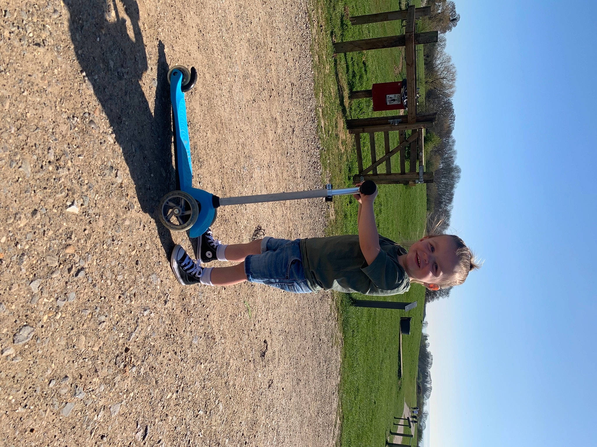 Koby is registered to the contest to win money with this photo: adventure, climbing_harness, elbow, electric_blue, fun, grass, jeans, joy, landscape, leisure, outdoor_shoe, people_in_nature, person, recreation, rock_climbing_equipment, rope, shadow, sky, soil, sport_climbing