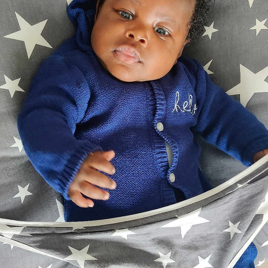 Kameronn participe au concours pour gagner de l'argent avec cette photo : baby, bodypart, clothing, couch, crib, cushion, face, finger, furniture, hand, head, homedecor, infantbed, jeans, knitwear, pants, person, photography, portrait, sweater