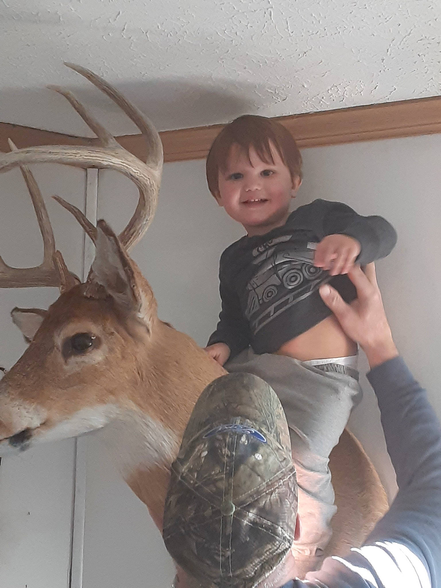 Maverick is registered to the contest to win money with this photo: antler, deer, deer_hunting, ear, fawn, joy, person, recreation, white_tailed_deer