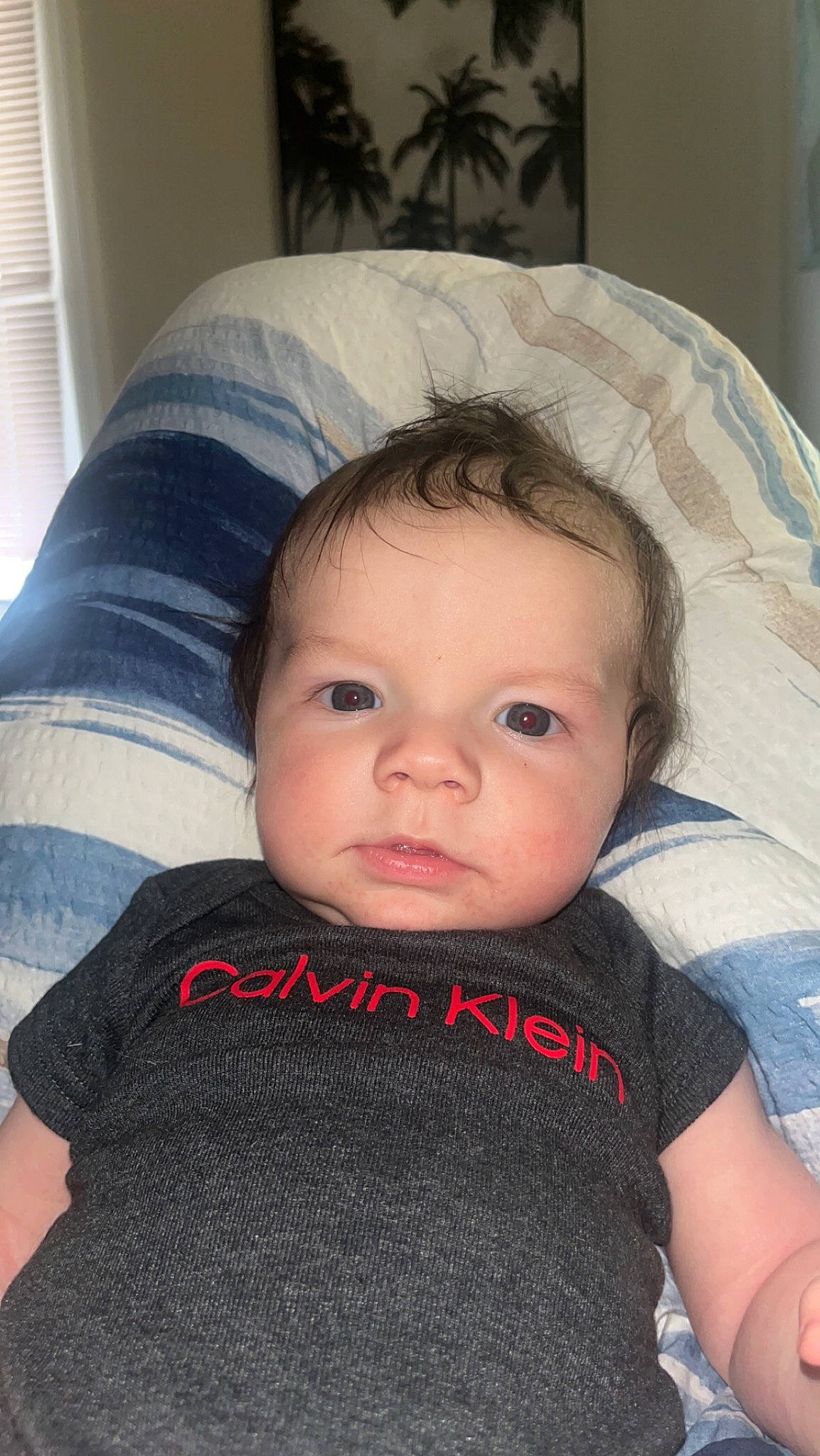 Malakai is registered to the contest to win money with this photo: baby_toddler_clothing, cheek, chin, clothing, comfort, ear, eye, eyebrow, eyelash, face, forehead, head, iris, lip, mouth, neck, nose, person, skin, sleeve