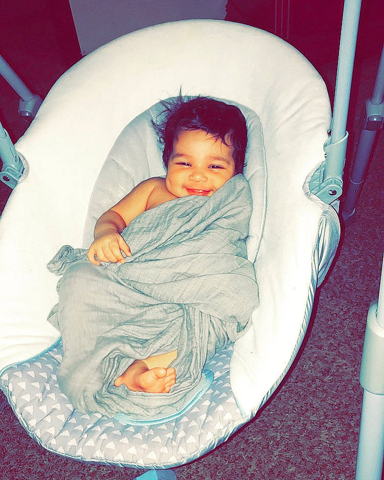 Letty is registered to the contest to win money with this photo: baby, baby_products, baby_toddler_clothing, child, comfort, human_body, joy, kitchen_utensil, lap, person, product, toddler