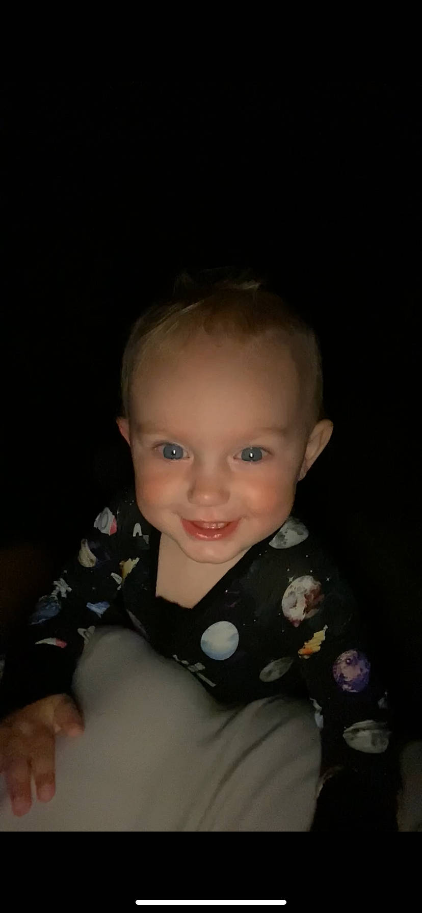 Alice is registered to the contest to win money with this photo: baby, baby_toddler_clothing, cheek, child, darkness, flash_photography, flooring, formal_wear, fun, happy, iris, joy, lip, mammal, nose, person, portrait, sitting, skin, sleeve