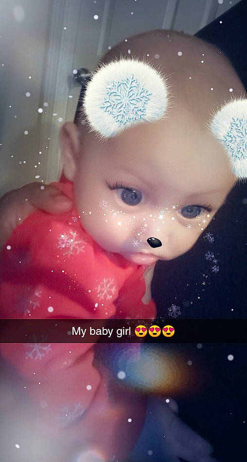 Sky is registered to the contest to win money with this photo: baby, cheek, child, close_up, doll, eye, eyelash, face, forehead, hair_accessory, happy, head, iris, person, photography, pink, skin, smile, space, toddler