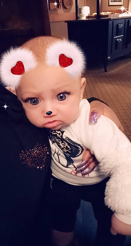 Sky is registered to the contest to win money with this photo: arm, baby, cheek, child, cool, ear, eye, eyebrow, face, forehead, fur, hair, hairstyle, head, lip, mouth, nose, person, pink, skin