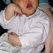 Elena participe au concours pour gagner de l'argent avec cette photo : baby, sleeping, infant, pink_clothing, blanket, hand, cozy, cute, child, portrait, young, resting, soft_fabric, newborn, toddler, skin, face, person, relaxed, indoors