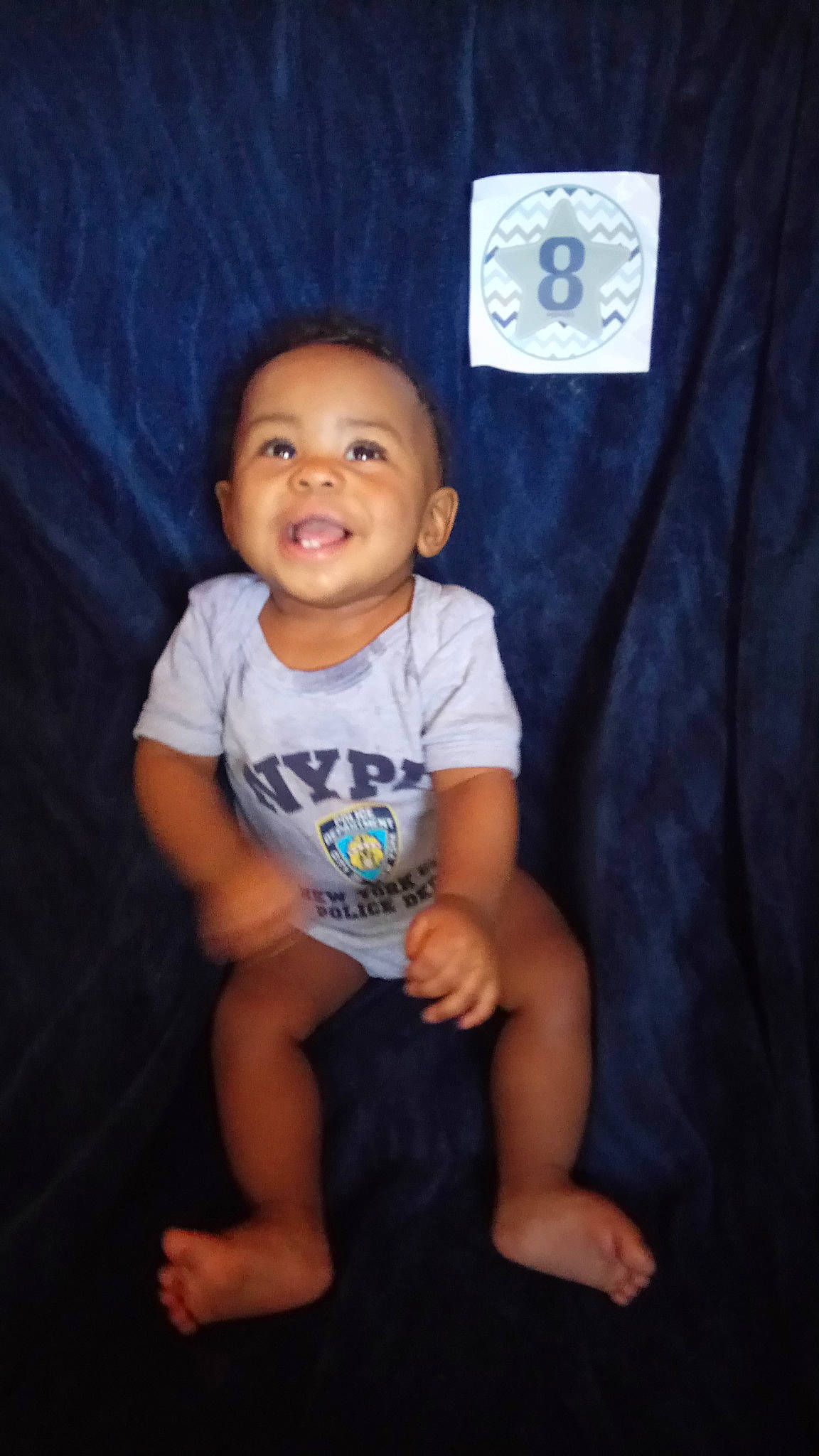Jeremiah joined the competition — help win amazing prizes! arm, baby, cheek, child, chin, fun, leg, person, portrait, sitting, smile, standing, t_shirt, toddler