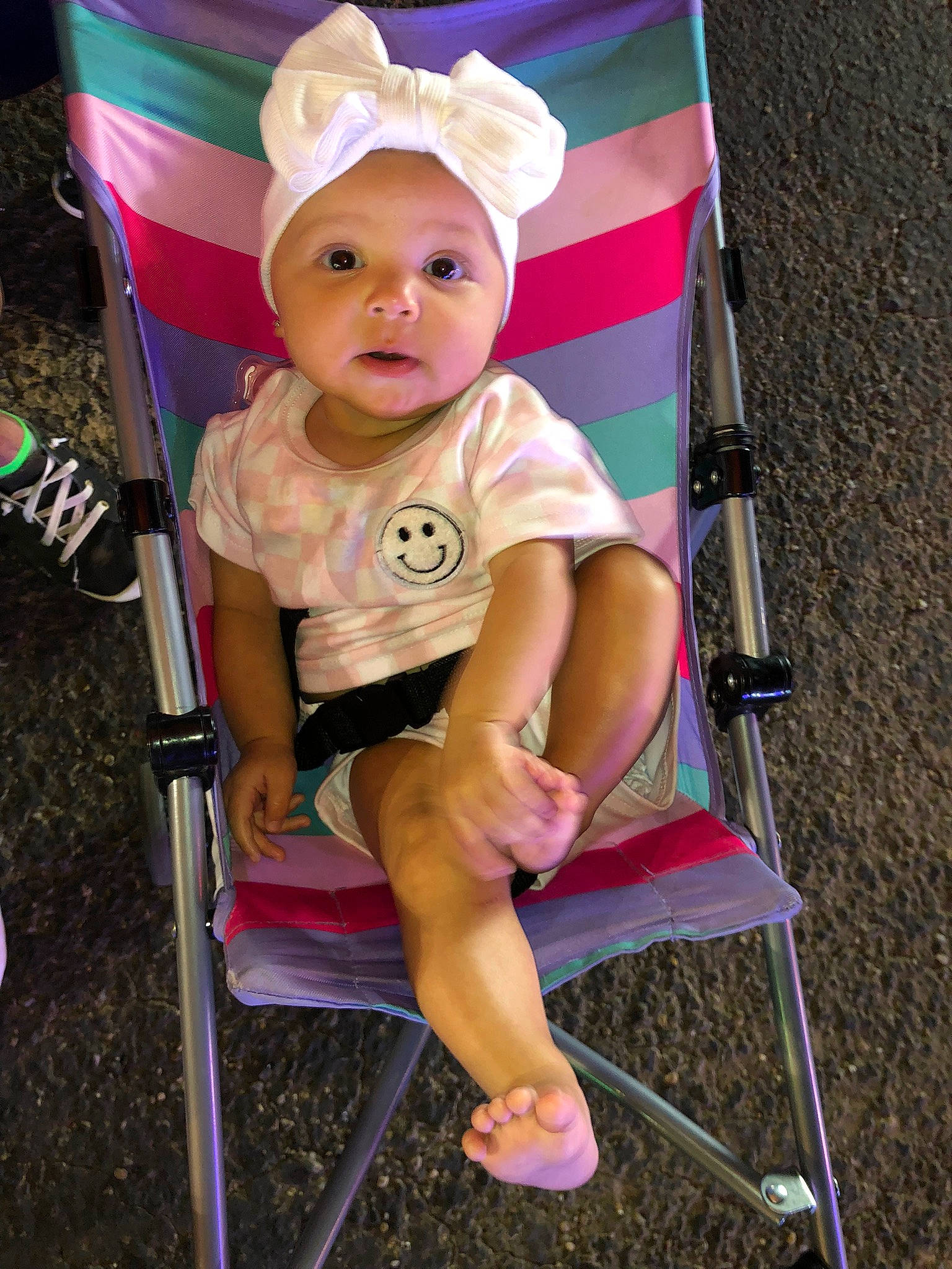 Ahlysix joined the competition — help win amazing prizes! baby, baby_carriage, baby_products, baby_toddler_clothing, cap, chair, child, fashion_accessory, folding_chair, fun, happy, hat, headwear, human_leg, leisure, magenta, person, pink, play, sitting
