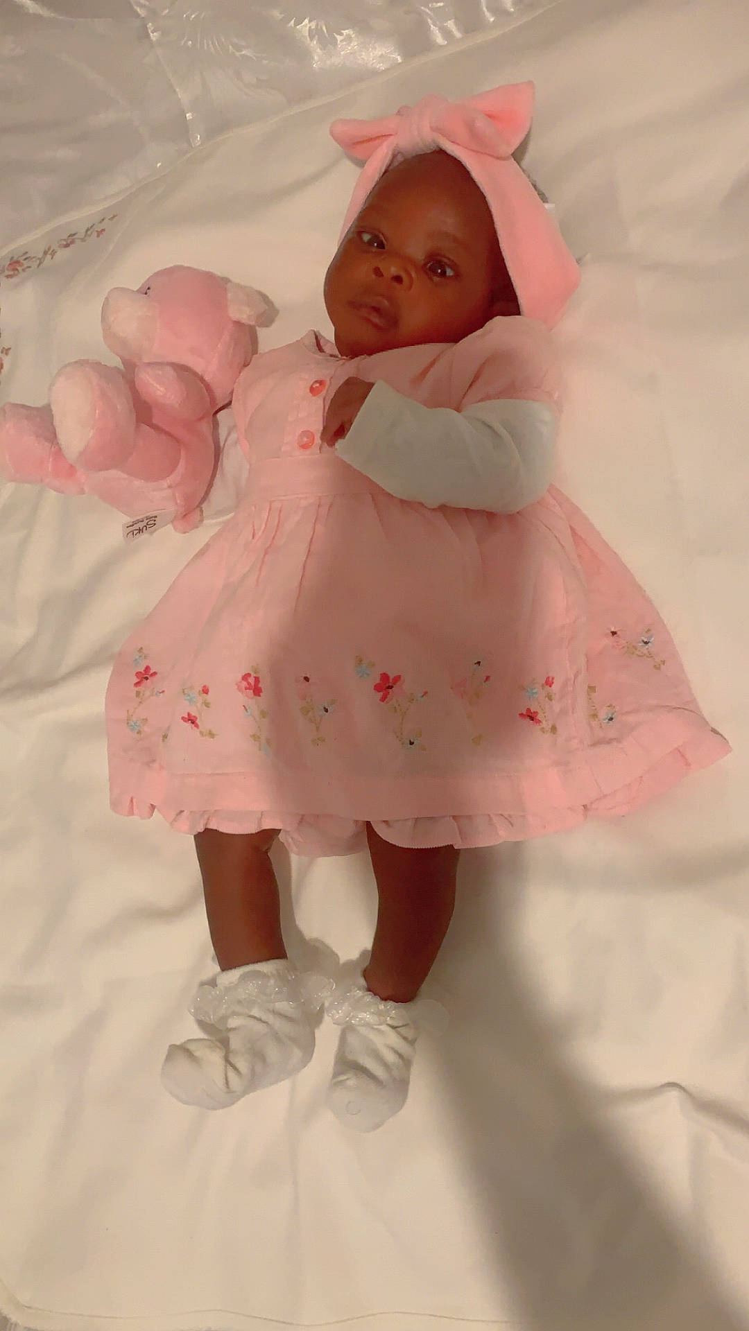 Havana joined the competition — help win amazing prizes! baby, bed, blanket, bodypart, bonnet, clothing, dress, face, finger, footwear, furniture, hand, hardwood, hat, head, hood, newborn, person, shoe, toy